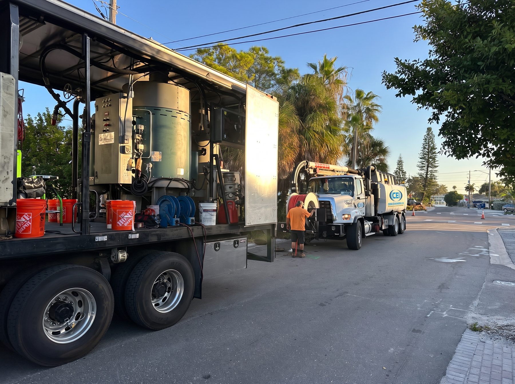 CEI boiler truck and Vacall combination truck staged for a mainline job