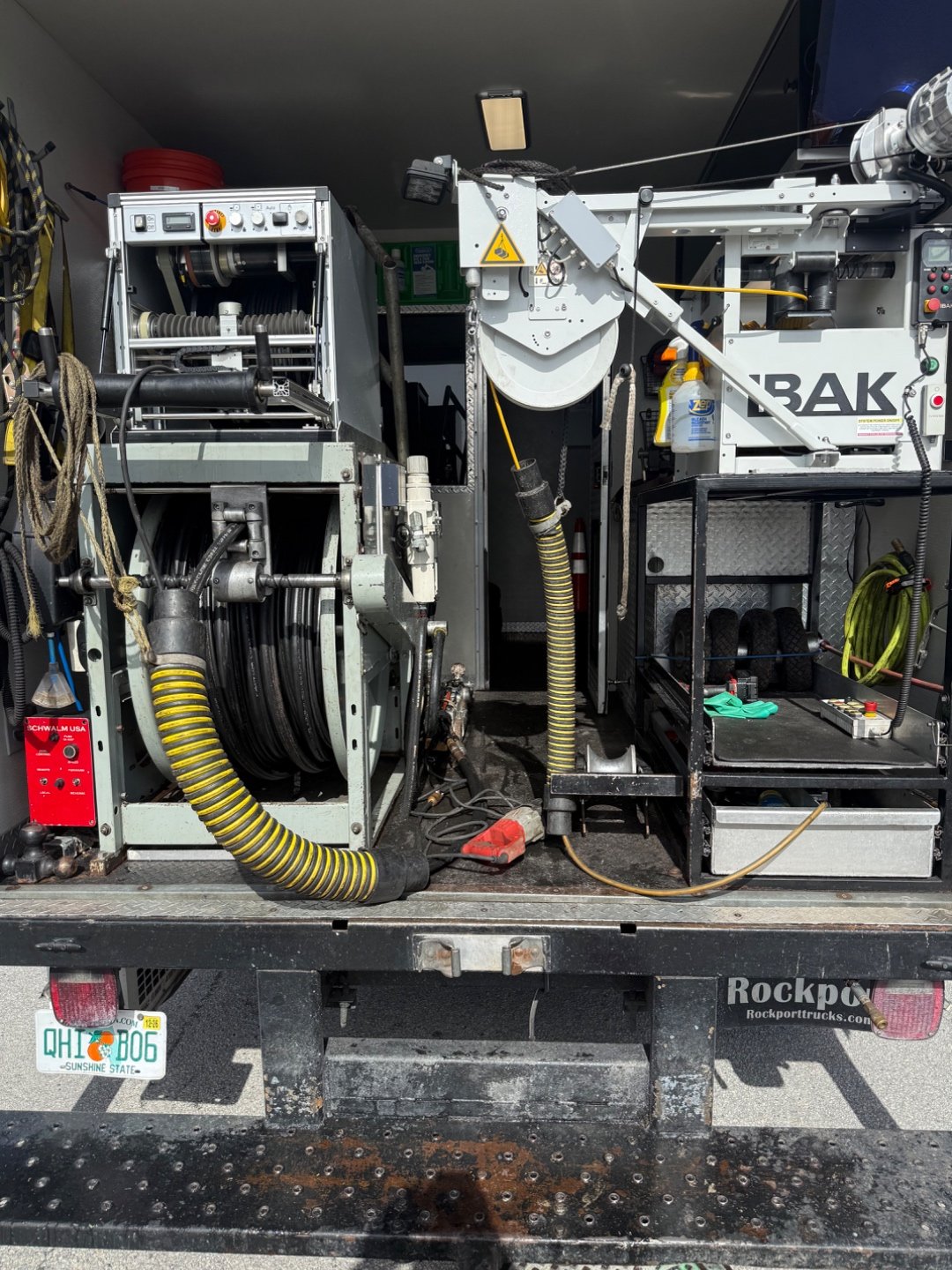 Inside a CEI service truck — Schwalm robotic cutter on the left for lateral reinstatement, IBAK inspection system on the right